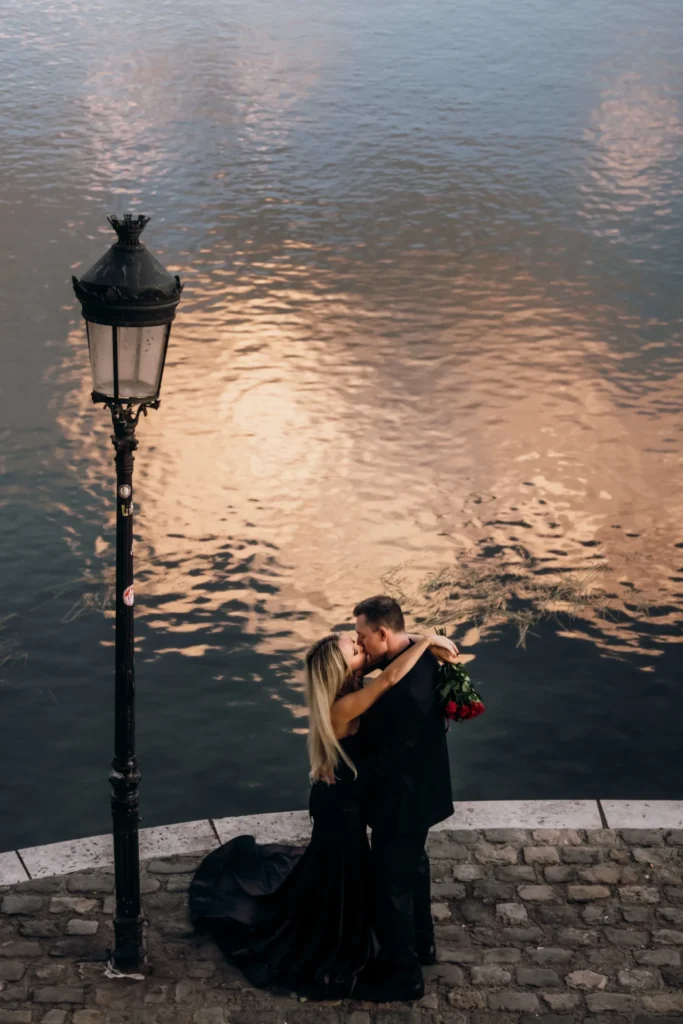 Gothic couple kissing in Paris
