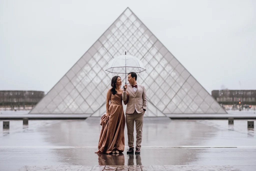 Paris photoshoot in the rain at the Louvre pyramid