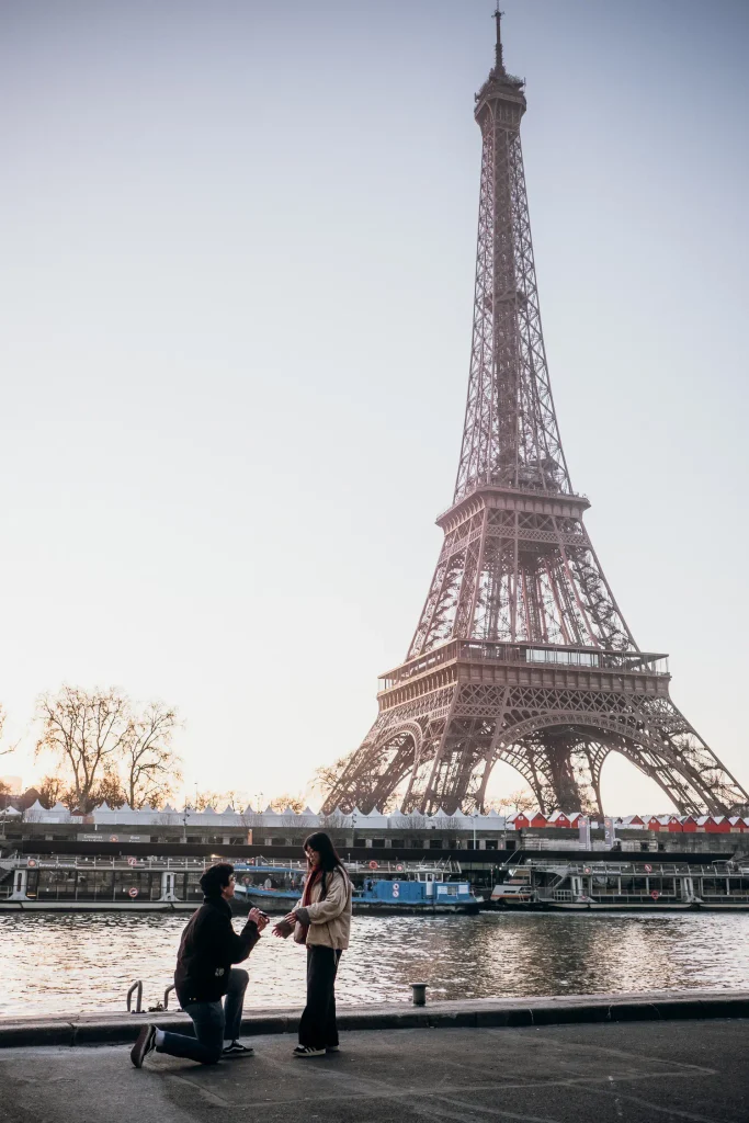 Surprise proposal photographer Paris at the riverbanks